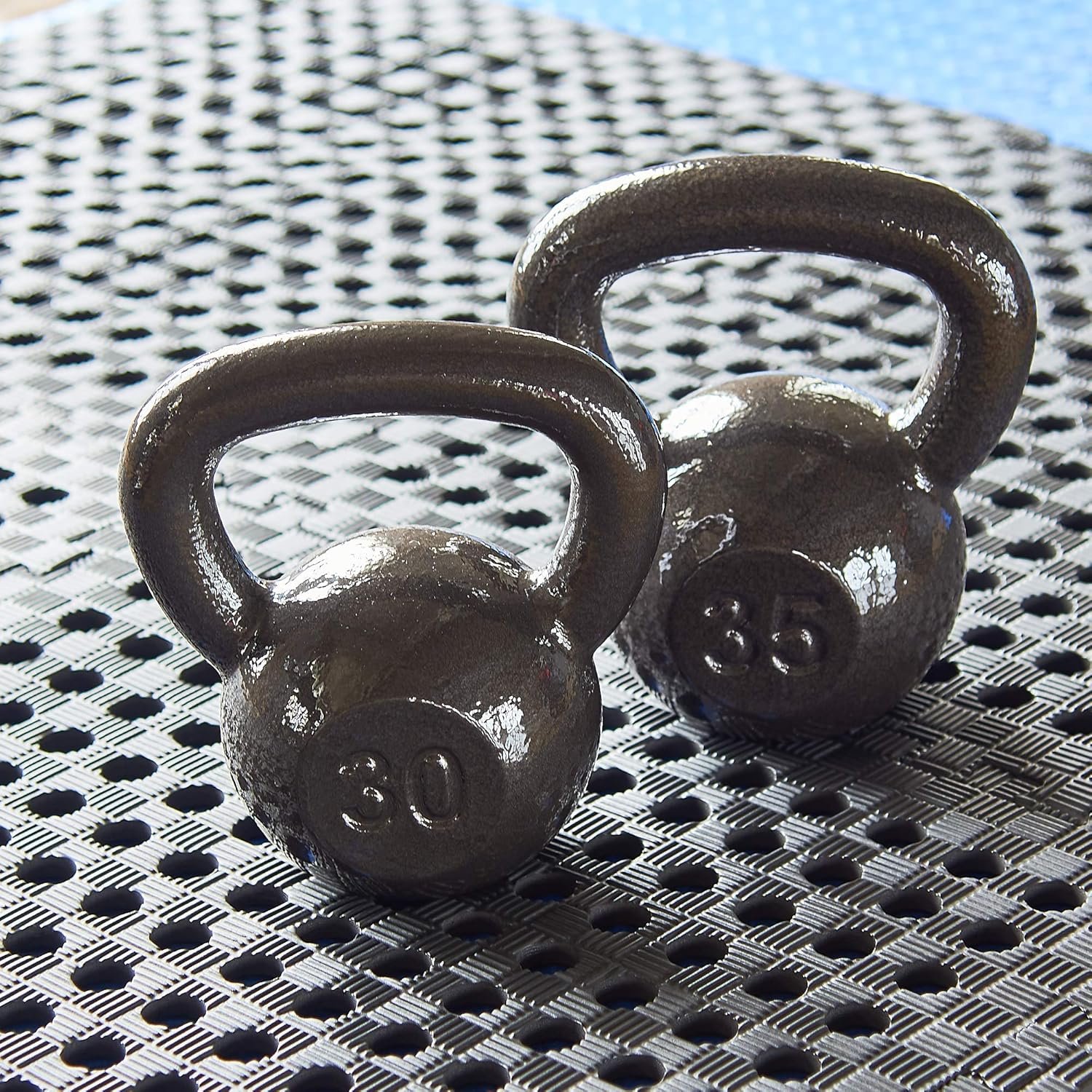 1760913300_Signature-Fitness-Kettlebell-Solid-Smooth-AdjustableCast-IronRubber-Base-for-Strength-Training-Home-Gym.jpg