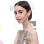 Lily Collins wore a strapless gold dress from Carolina Herrera to the King&rsquo;s Trust Celebration in London