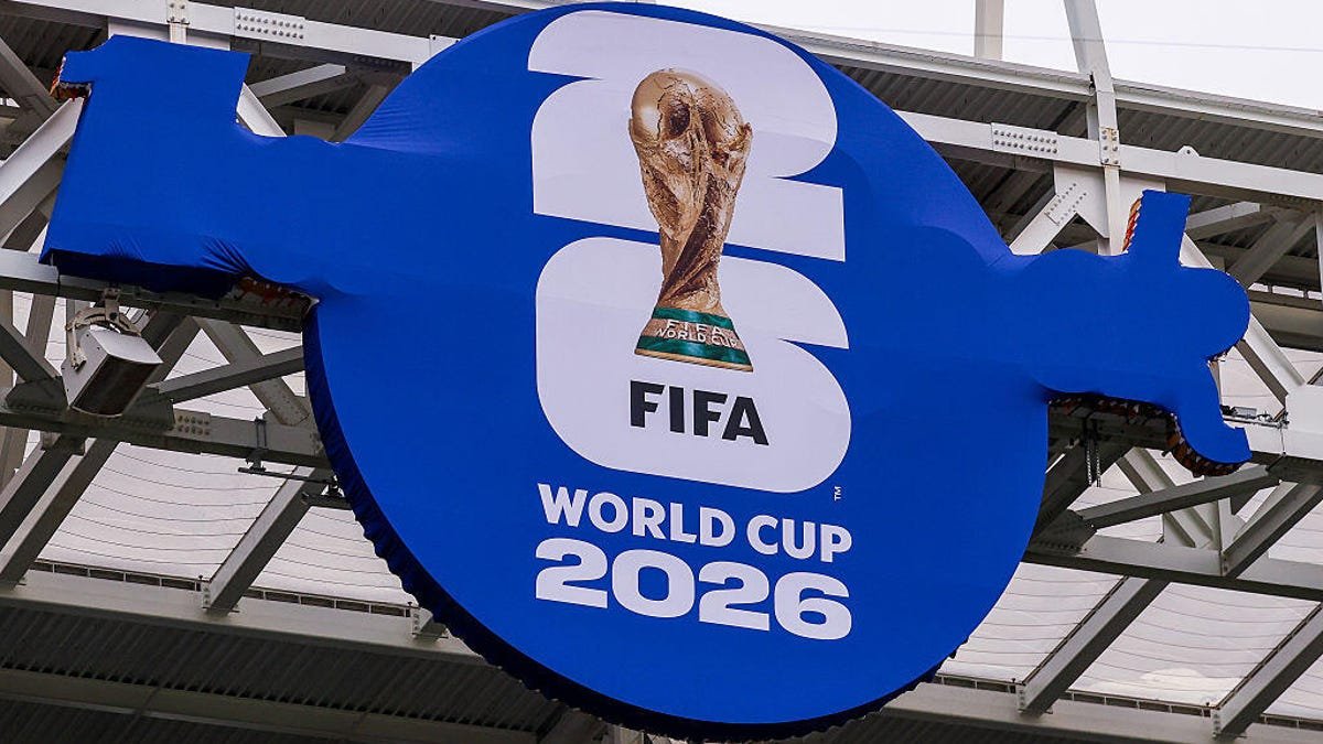 A general view of the World Cup logo hanging from a stadium during a FIFA World Cup 2026 Group H match between Saudi Arabia and Uruguay on June 15, 2026, at Miami Stadium.