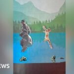 A cut-out diorama of children jumping into a lake. There are amoebae underneath them.